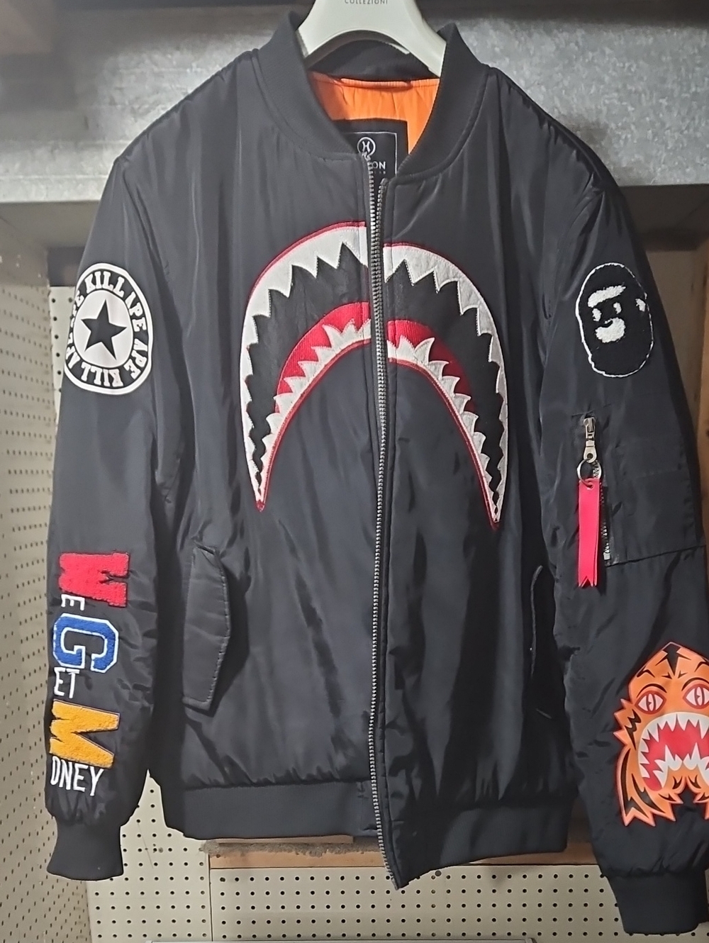 Black Shark-Mouth Patch Bomber Jacket with Multicolor Sleeve Patches Hudson